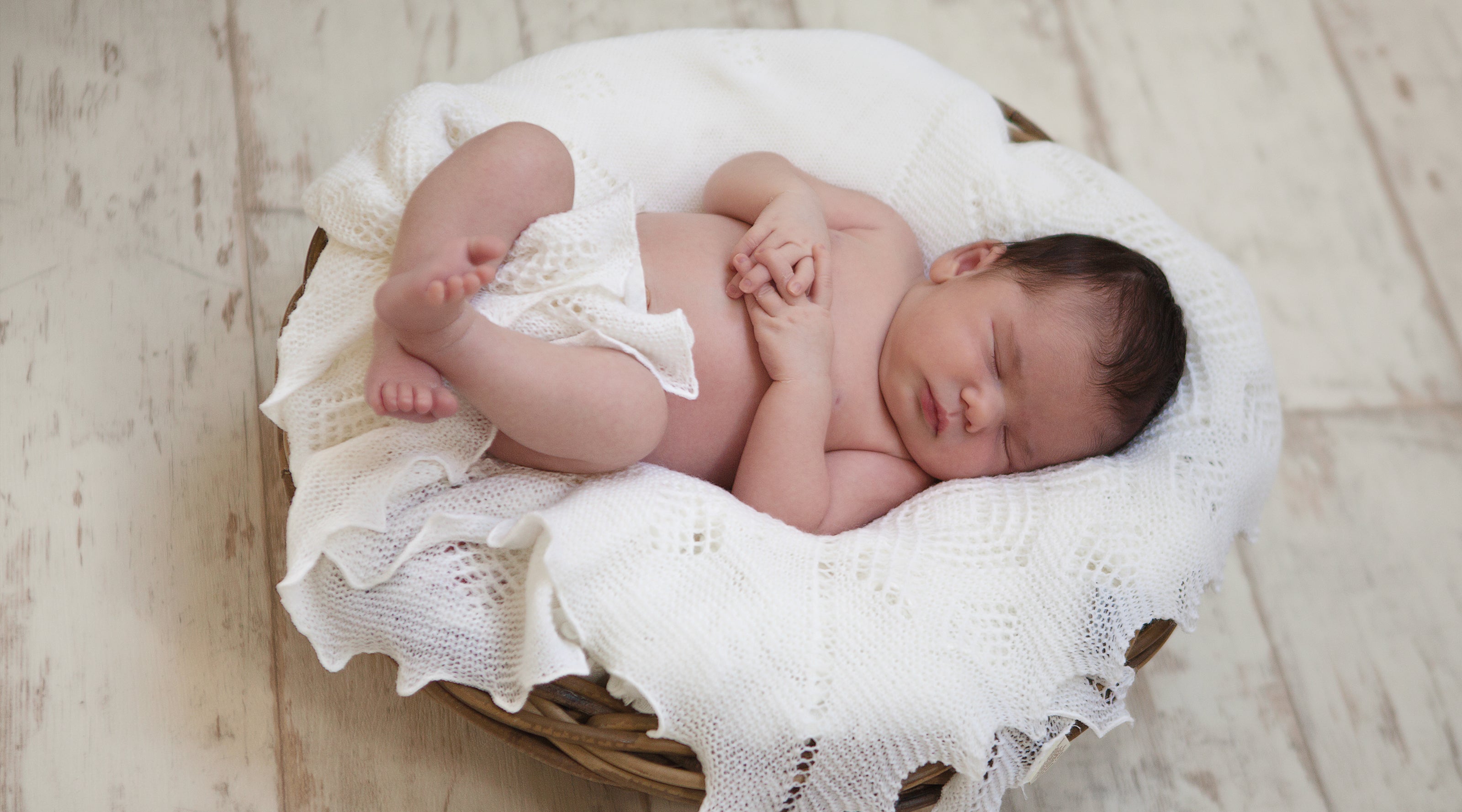 Baby in Shawl and Basket